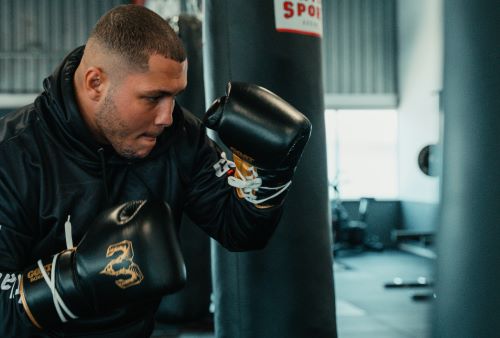 boxer hitting a heavy bag