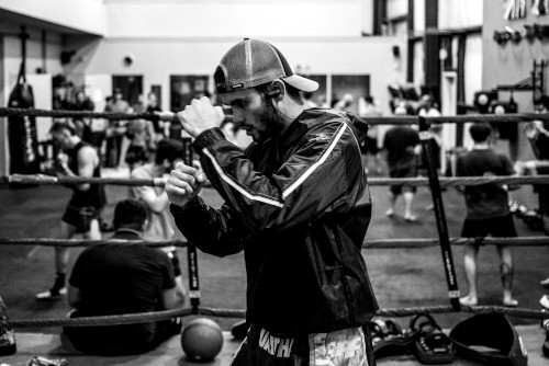 Shadow boxing in a gym
